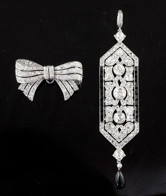 An attractive 1920s Cartier, platinum, diamond and black onyx drop pendant, pendant 2.75in excl. bale